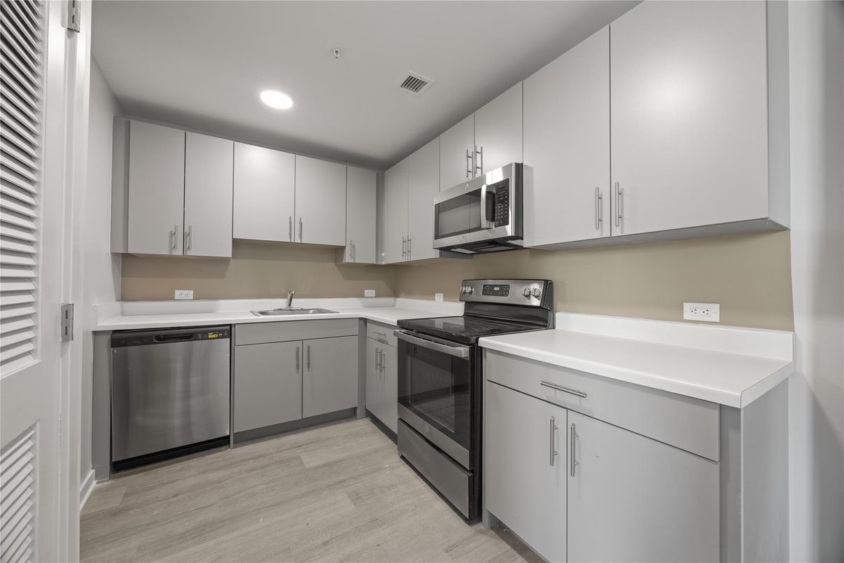 Interior, Kitchen, Recessed Lighting, Stainless Steel Appliances, Wood Texture Flooring