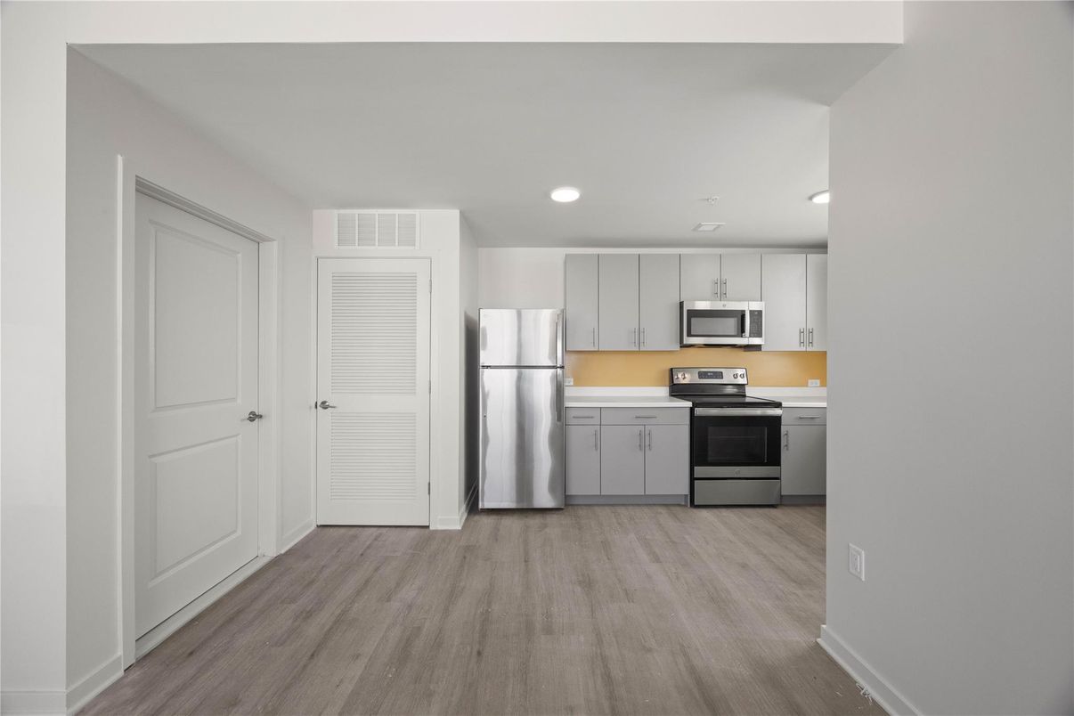 Interior, Kitchen, Recessed Lighting, Stainless Steel Appliances, Wood Texture Flooring