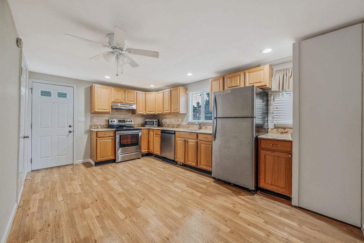 Interior, Kitchen, Recessed Lighting, Stainless Steel Appliances, Wood Texture Flooring