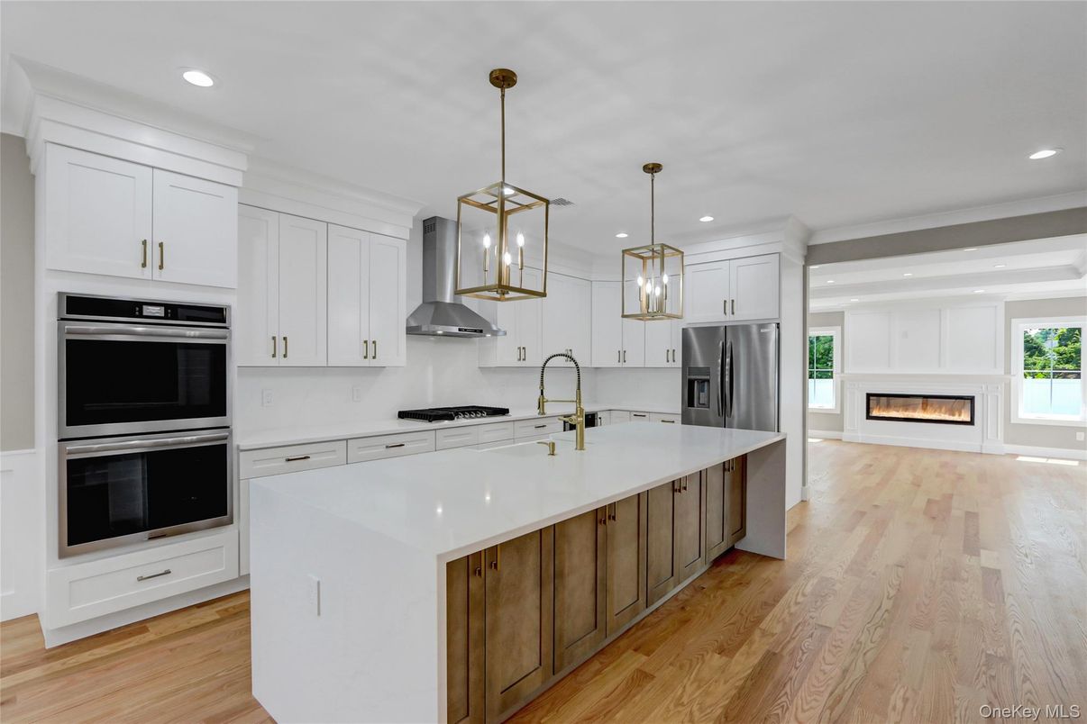 Fireplace, Interior, Kitchen, Pendant Lights, Recessed Lighting, Stainless Steel Appliances, Wood Texture Flooring