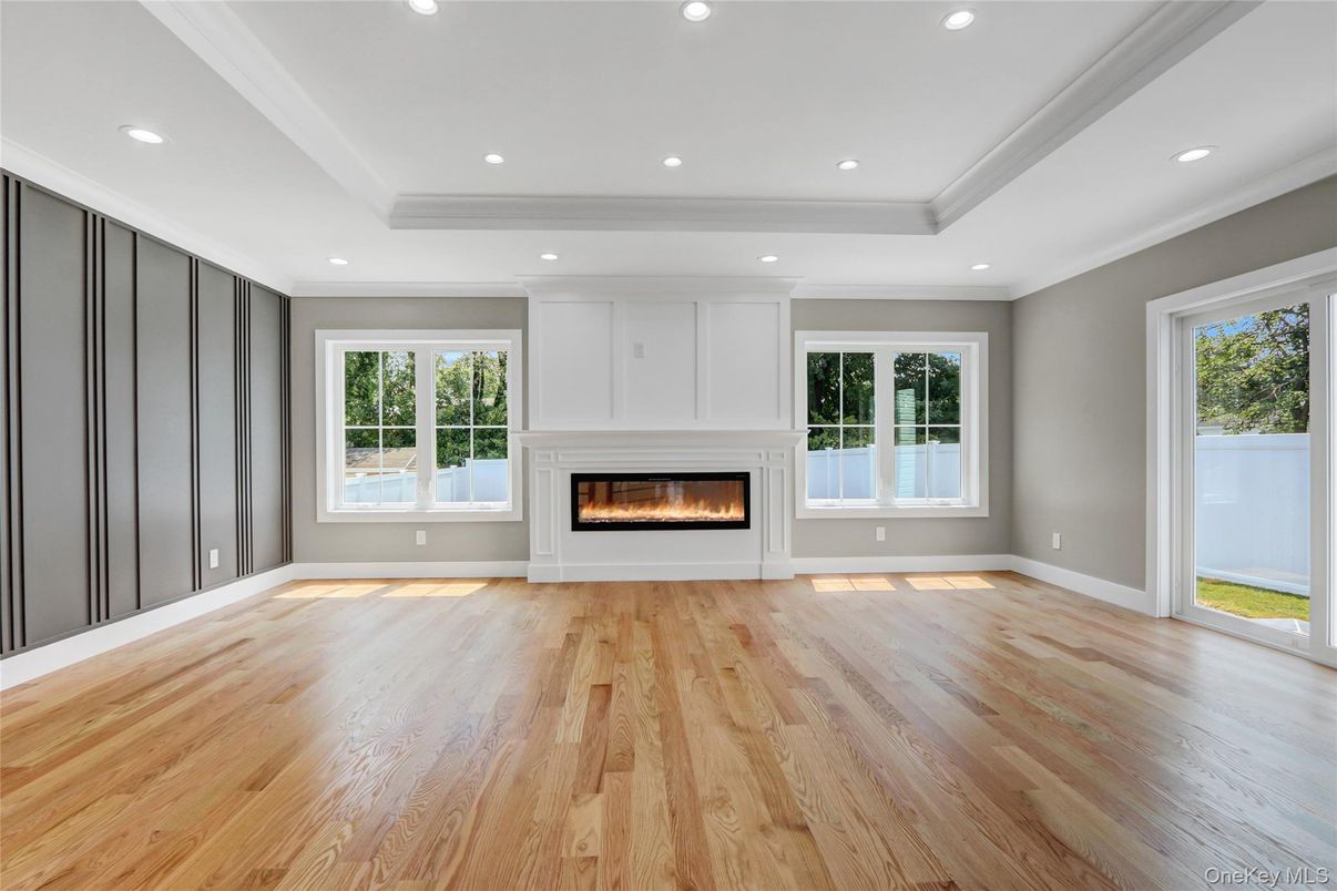 Empty room, Fireplace, Interior, Recessed Lighting, Wood Texture Flooring