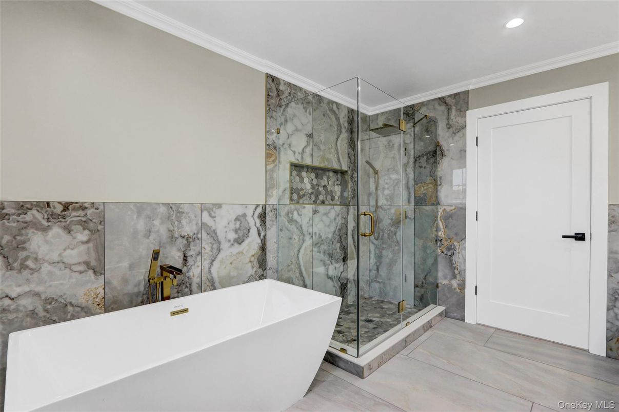 Bathroom, Free Standing Baths, Glass Shower, Interior, Marble Walls, Recessed Lighting