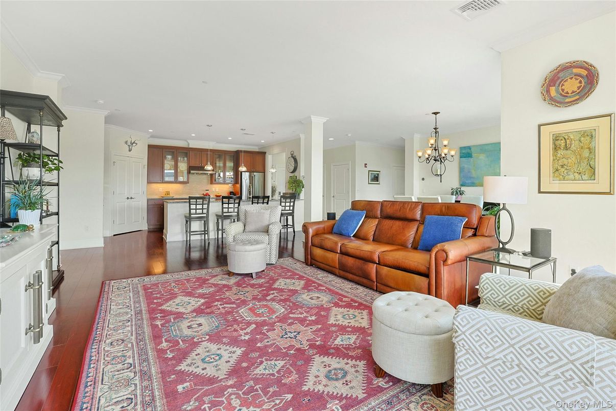 Chandelier, Interior, Kitchen, Living room, Pendant Lights, Recessed Lighting, Stainless Steel Appliances, Wood Texture Flooring