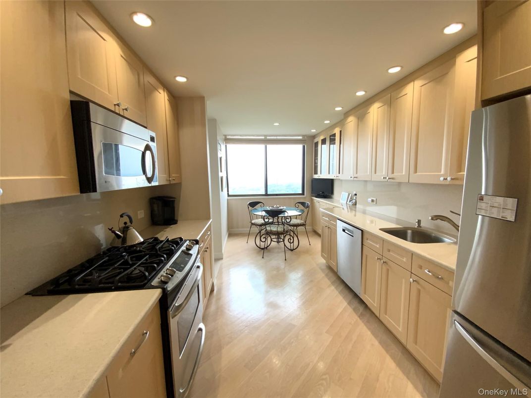 Dining room, Interior, Kitchen, Recessed Lighting, Stainless Steel Appliances, Wood Texture Flooring