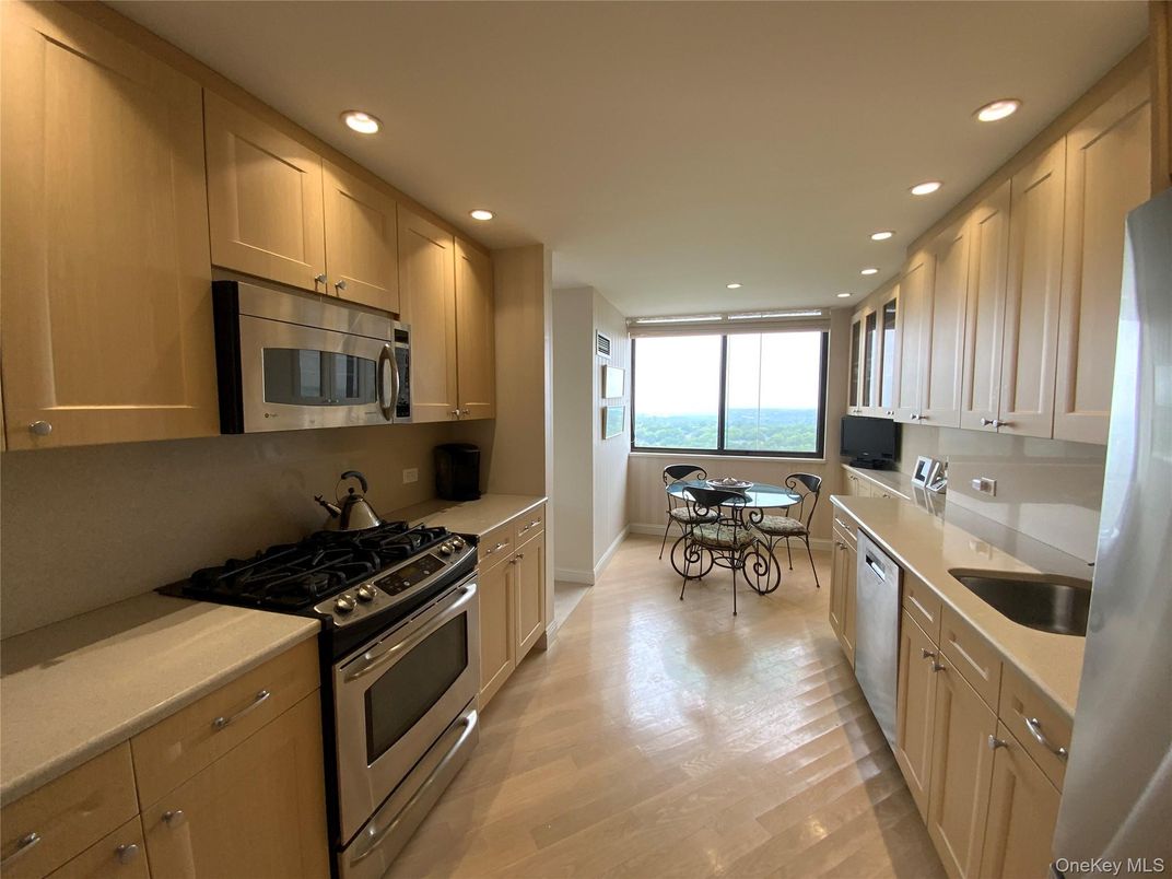 Dining room, Interior, Kitchen, Recessed Lighting, Stainless Steel Appliances, Water, Wood Texture Flooring