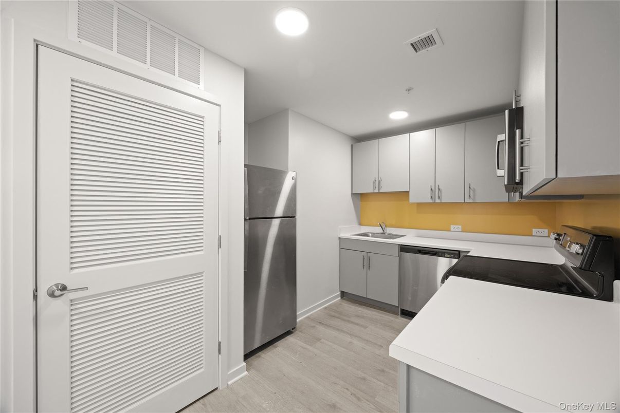 Interior, Kitchen, Recessed Lighting, Stainless Steel Appliances, Wood Texture Flooring