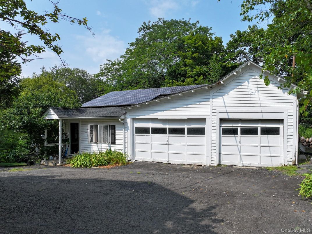 Attached, Exterior, Facade, Solar Panels, Ranch