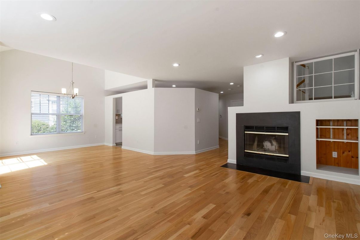 Empty room, Fireplace, Interior, Pendant Lights, Recessed Lighting, Wood Texture Flooring
