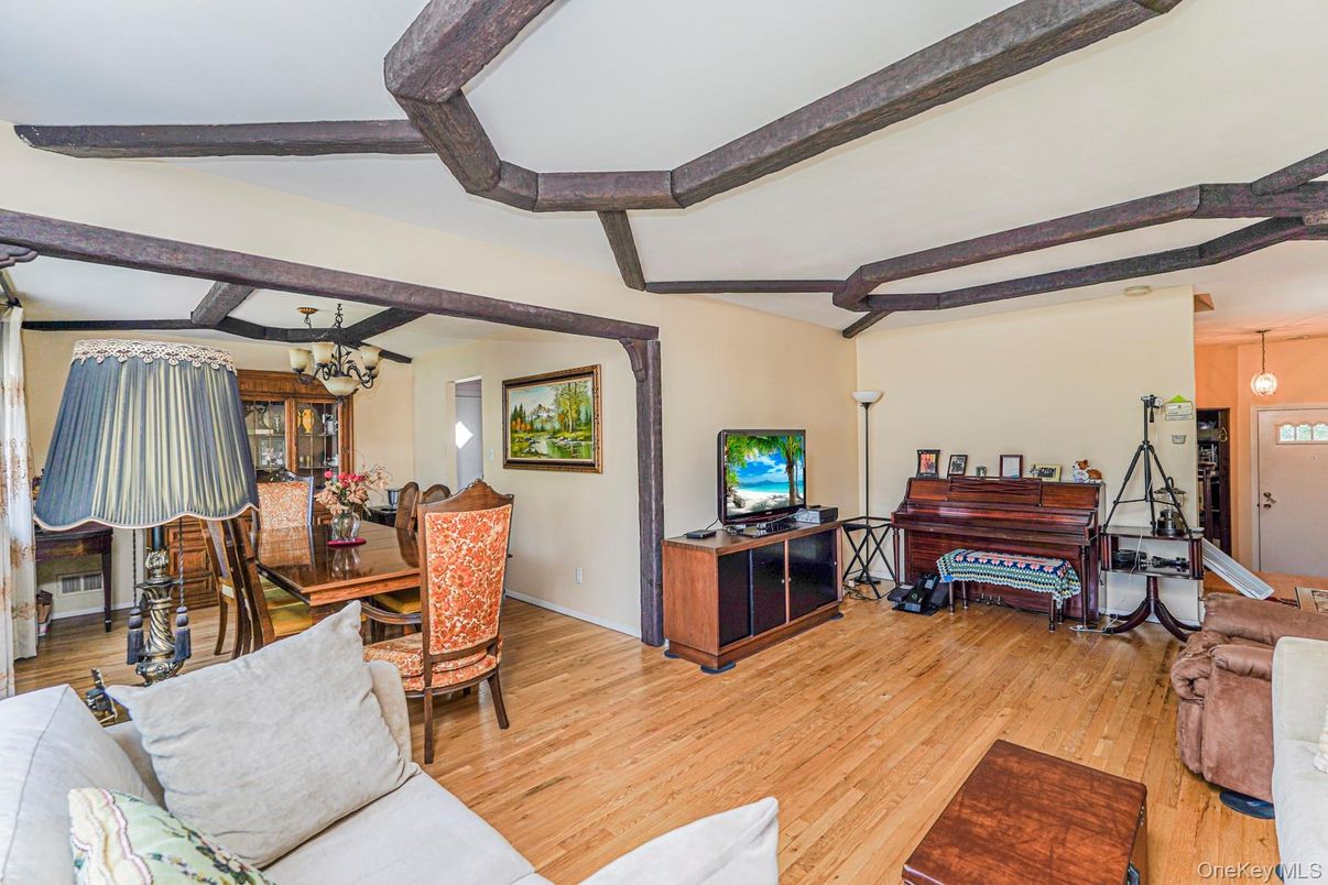 Chandelier, Dining room, Interior, Living room, Pendant Lights, Piano, Wooden Beams, Wood Texture Flooring