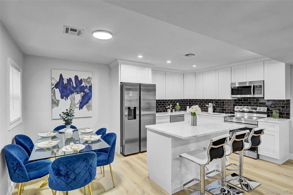 Dining room, Interior, Kitchen, Recessed Lighting, Stainless Steel Appliances, Wood Texture Flooring