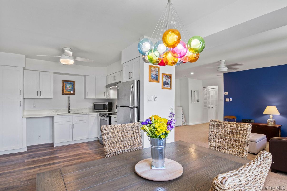 Dining room, Interior, Kitchen, Recessed Lighting, Stainless Steel Appliances, Wood Texture Flooring