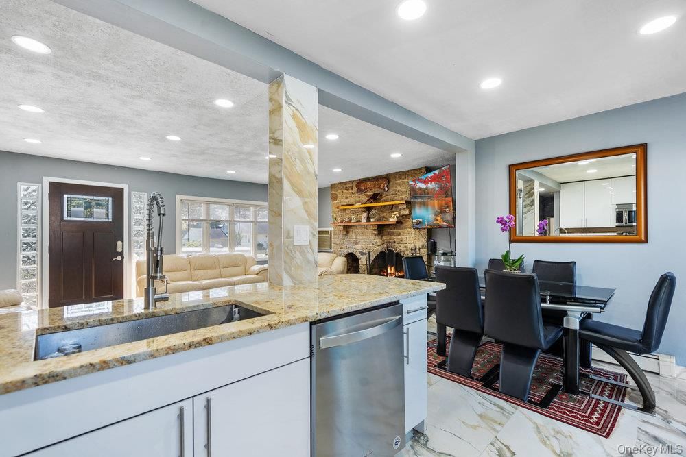 Dining room, Fireplace, Interior, Kitchen, Living room, Marble, Recessed Lighting, Stone Walls