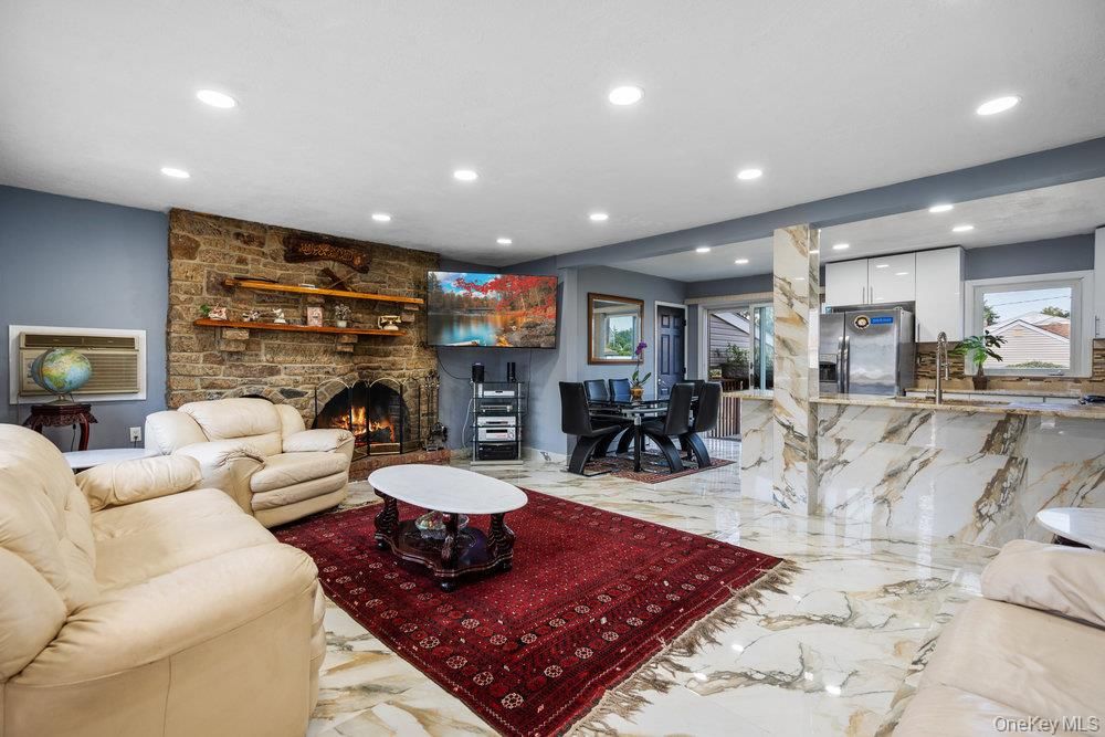Dining room, Fireplace, Interior, Kitchen, Living room, Marble, Recessed Lighting, Stone Walls