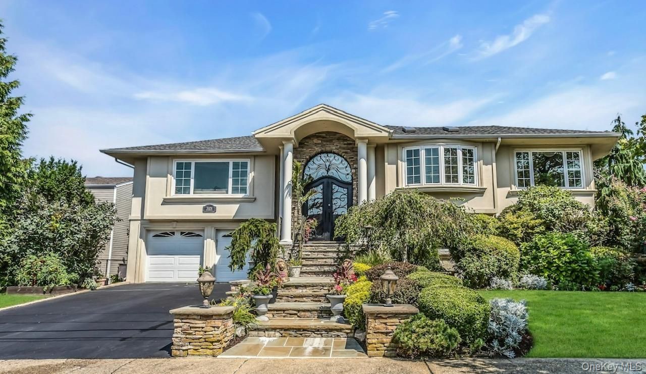 Attached, Exterior, Facade, Raised Ranch