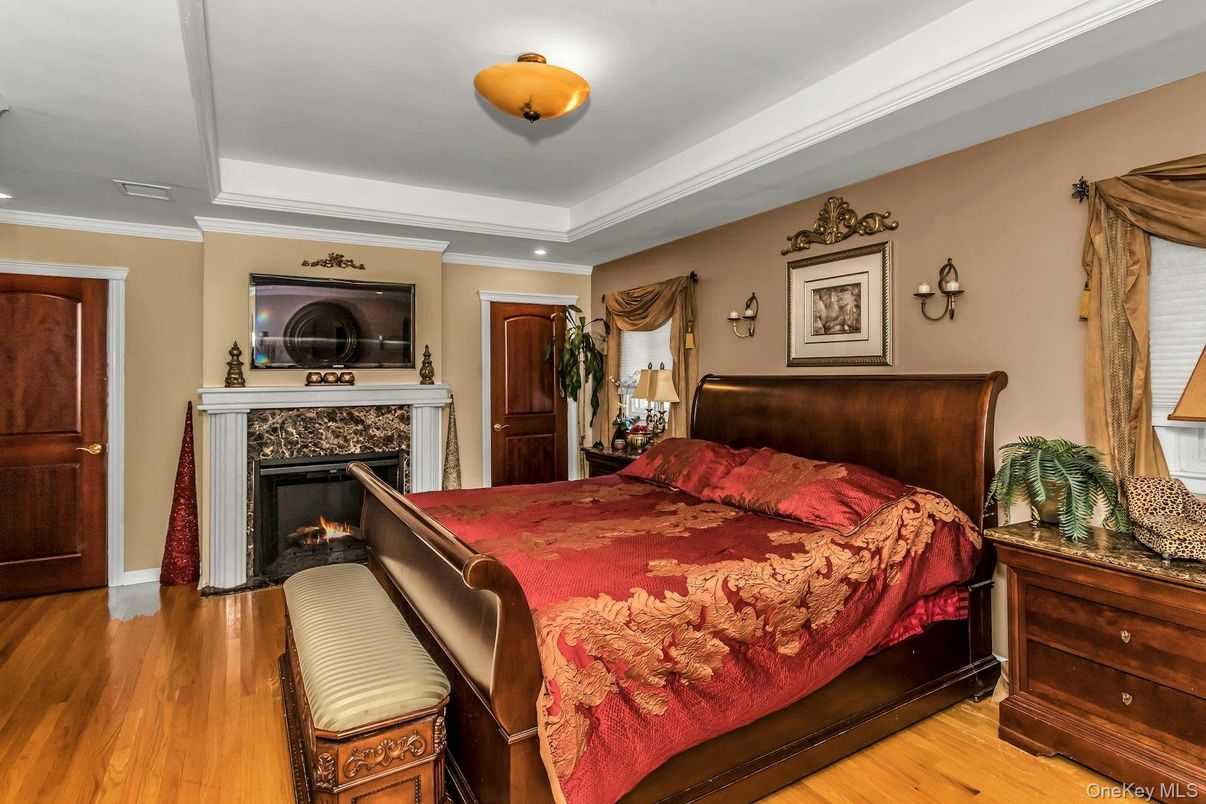 Bedroom, Fireplace, Interior, Recessed Lighting, Wood Texture Flooring