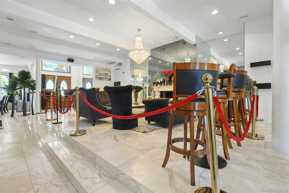 Chandelier, Fireplace, Interior, Living room, Marble, Recessed Lighting