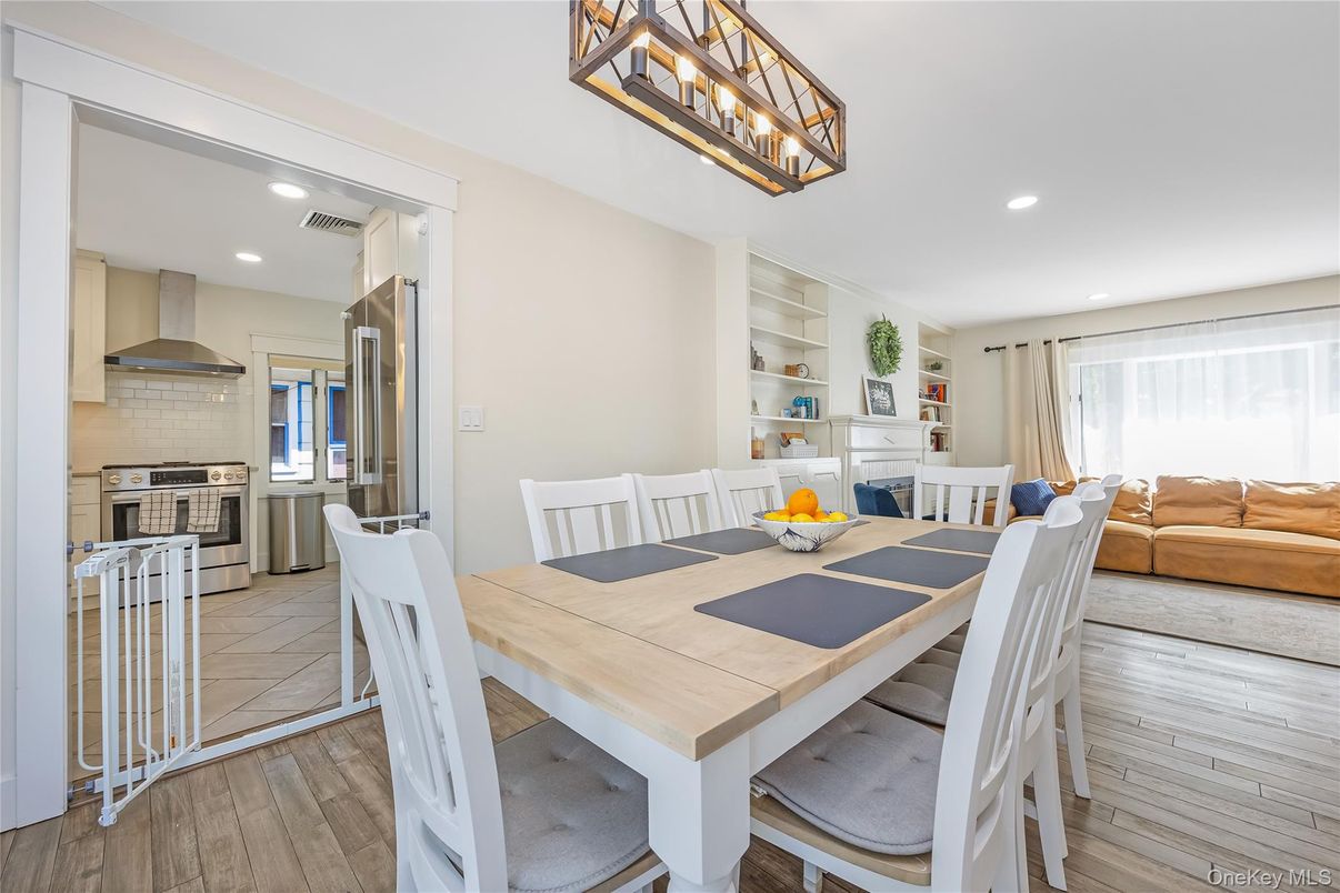 Dining room, Interior, Kitchen, Living room, Recessed Lighting, Stainless Steel Appliances, Wood Texture Flooring