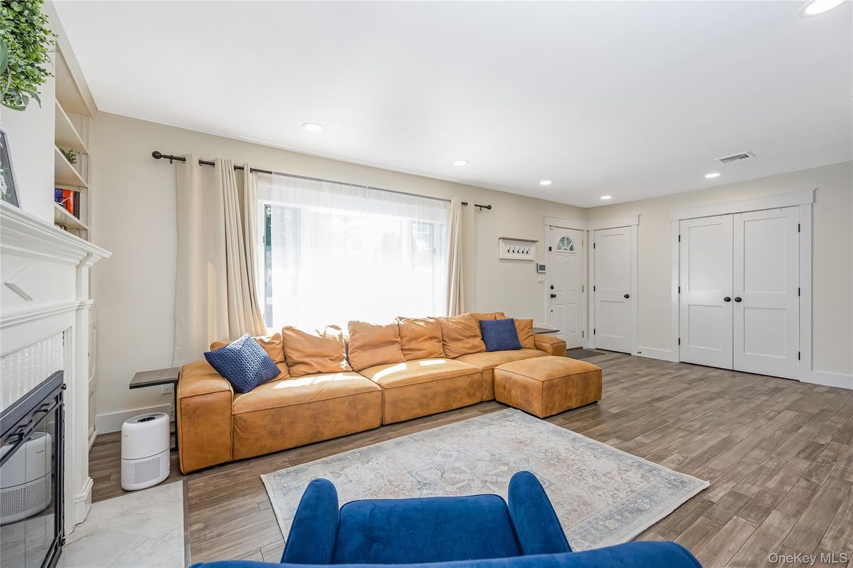 Fireplace, Interior, Living room, Recessed Lighting, Wood Texture Flooring