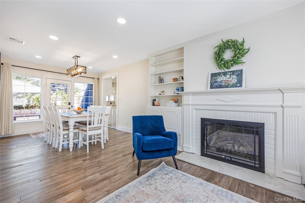 Dining room, Fireplace, Interior, Pendant Lights, Recessed Lighting, Wood Texture Flooring