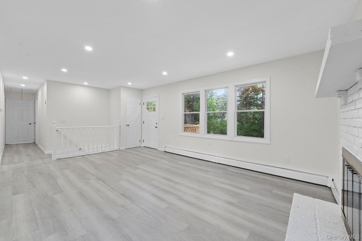 Empty room, Fireplace, Interior, Recessed Lighting, Wood Texture Flooring