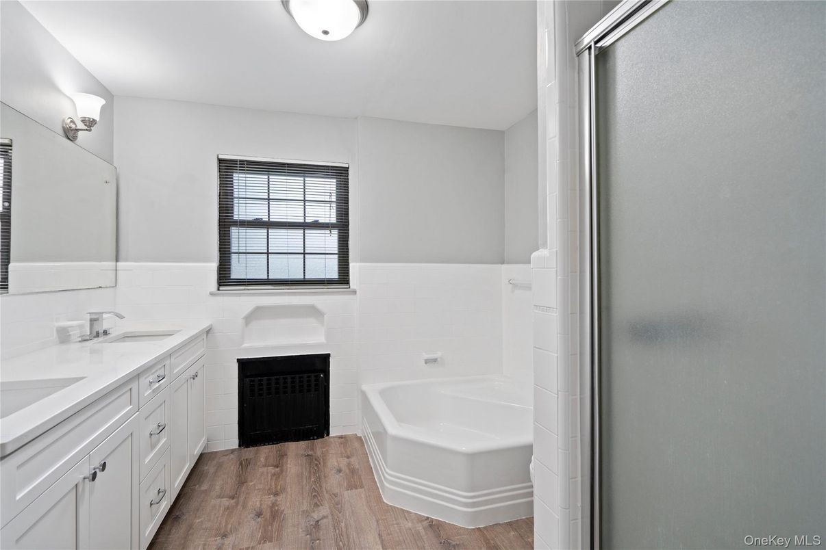 Bathroom, Dual Sink Vanities, Fireplace, Interior, Wood Texture Flooring