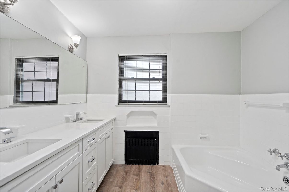 Bathroom, Dual Sink Vanities, Fireplace, Interior, Wood Texture Flooring
