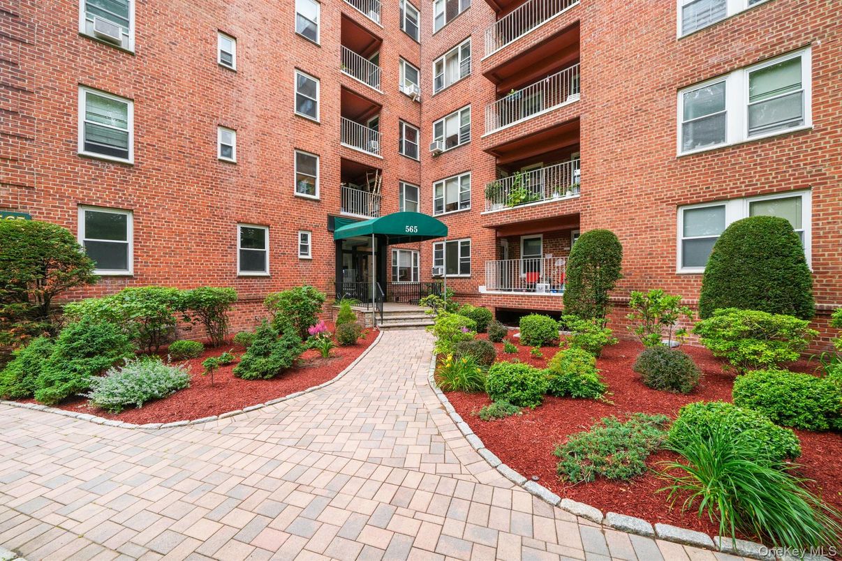 Exterior, Facade, Brick Facade, Condo Building