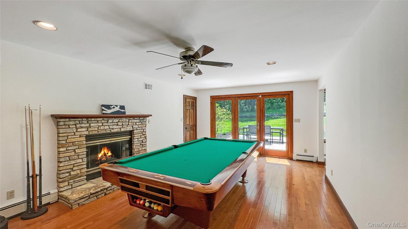 Billiard Table, Fireplace, Game Room, Interior, Recessed Lighting, Wood Texture Flooring