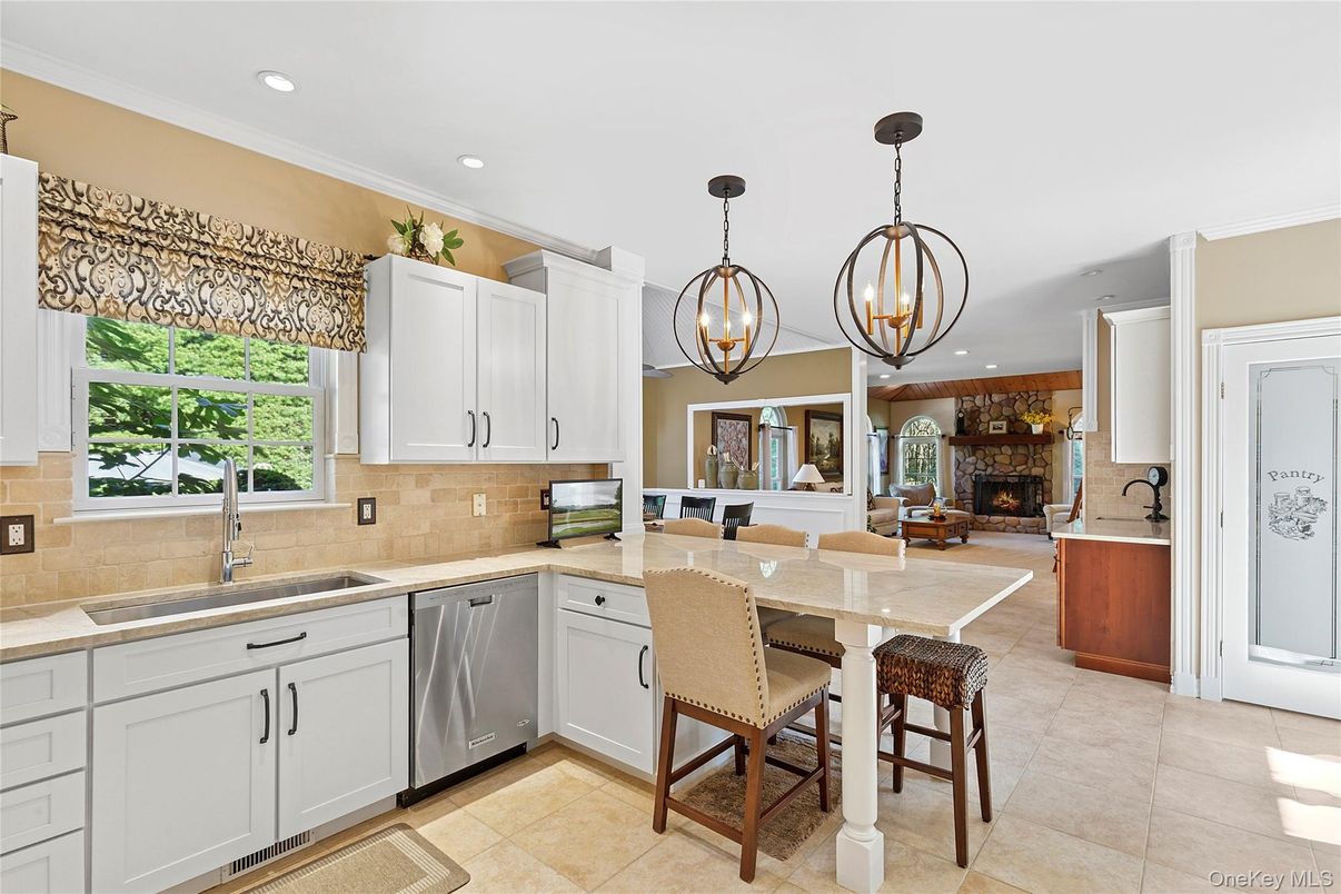 Dining room, Fireplace, Interior, Kitchen, Pendant Lights, Recessed Lighting, Stainless Steel Appliances