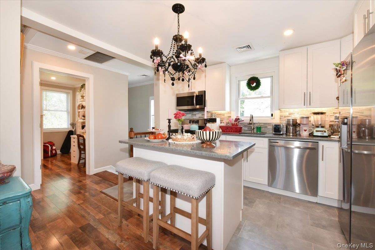 Chandelier, Interior, Kitchen, Recessed Lighting, Stainless Steel Appliances, Wood Texture Flooring