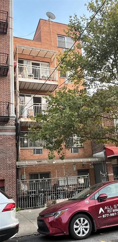 Exterior, Facade, Brick Facade, Condo Building