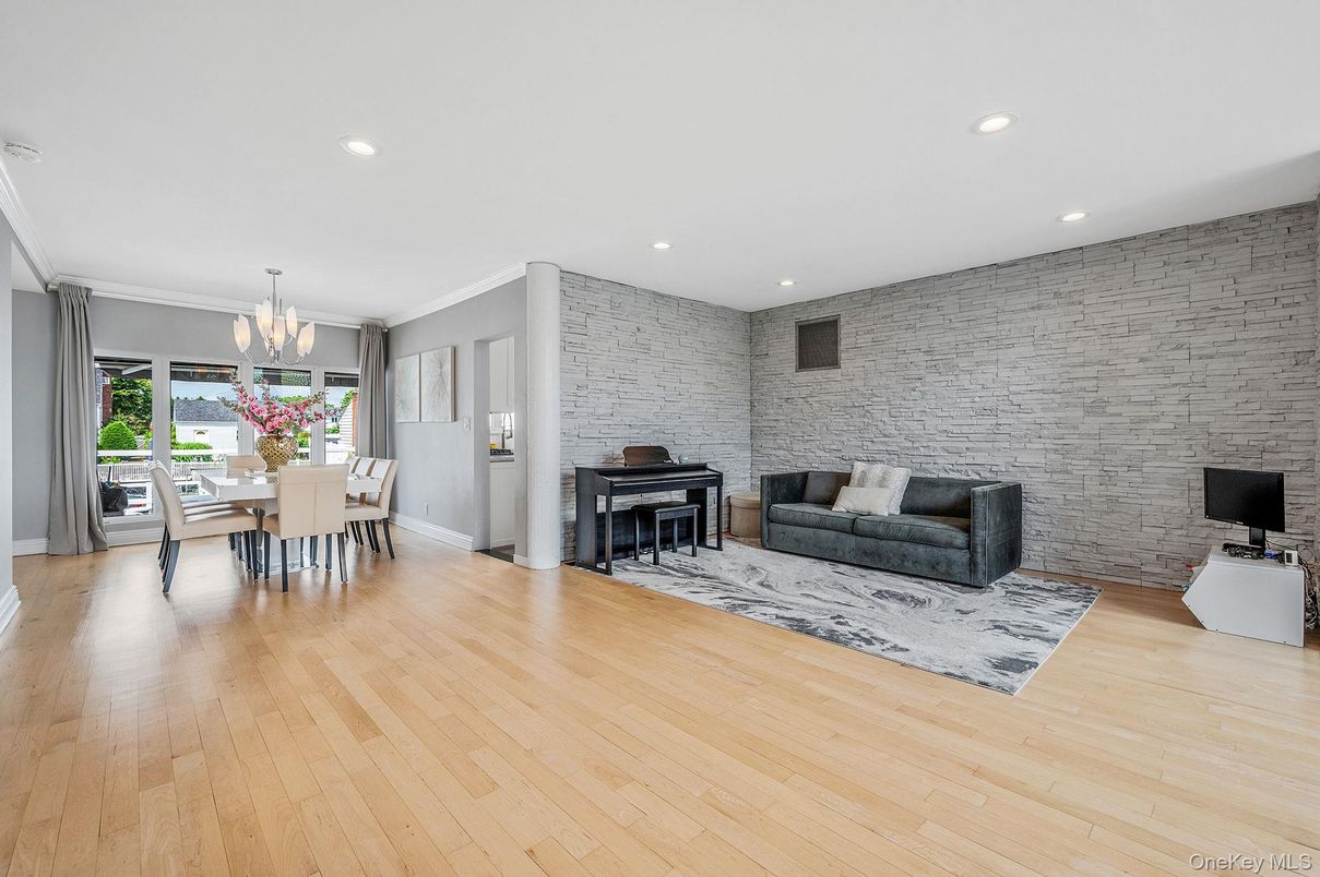 Chandelier, Dining room, Interior, Piano, Recessed Lighting, Stone Walls, Wood Texture Flooring