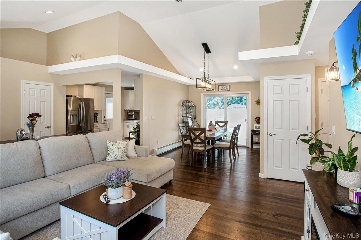 Dining room, Interior, Kitchen, Living room, Pendant Lights, Recessed Lighting, Stainless Steel Appliances, Wood Texture Flooring