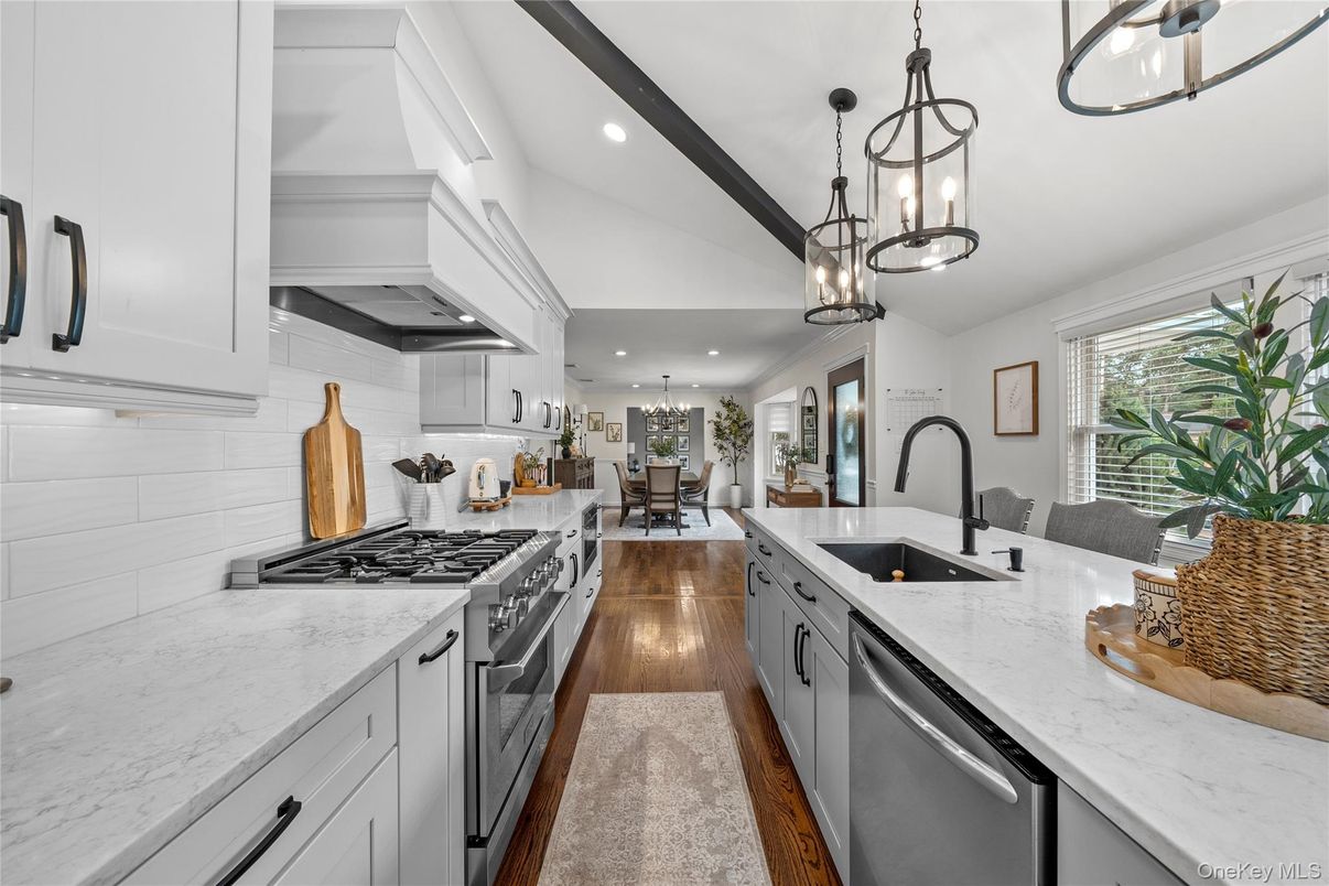 Chandelier, Dining room, Interior, Kitchen, Pendant Lights, Recessed Lighting, Stainless Steel Appliances, Wood Texture Flooring