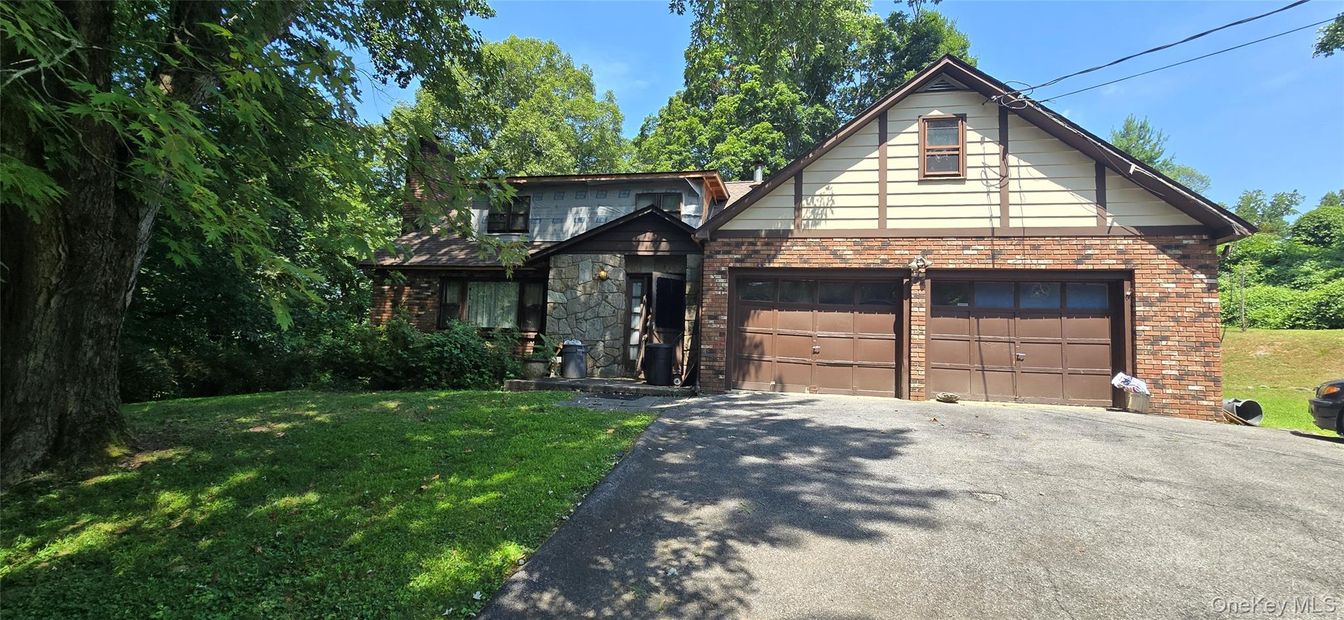 Attached, Exterior, Facade, Brick Facade, Tudor Revival