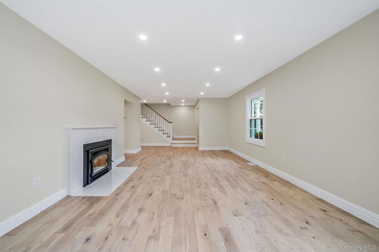 Empty room, Fireplace, Interior, Recessed Lighting, Wood Texture Flooring