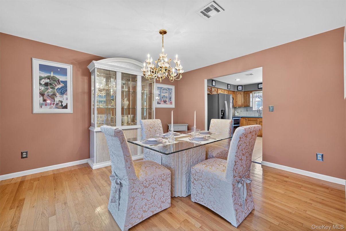 Chandelier, Dining room, Interior, Kitchen, Recessed Lighting, Stainless Steel Appliances, Wood Texture Flooring