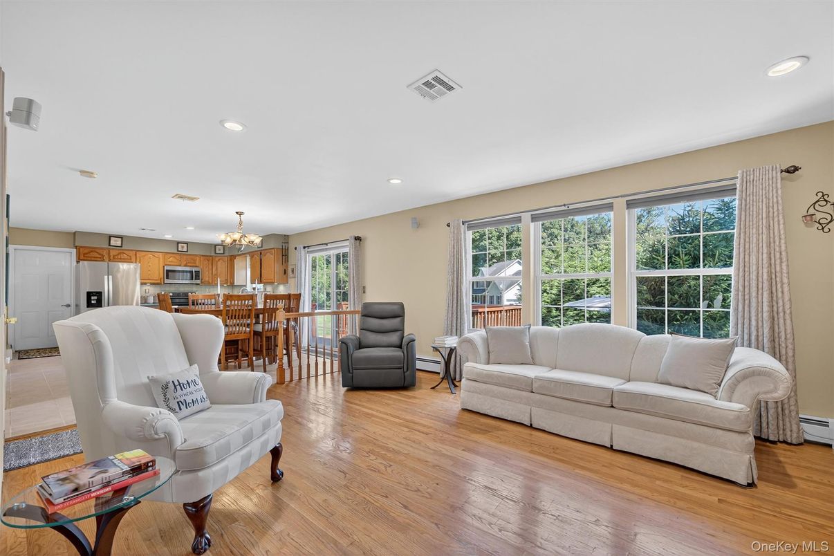 Chandelier, Dining room, Interior, Kitchen, Living room, Recessed Lighting, Stainless Steel Appliances, Wood Texture Flooring