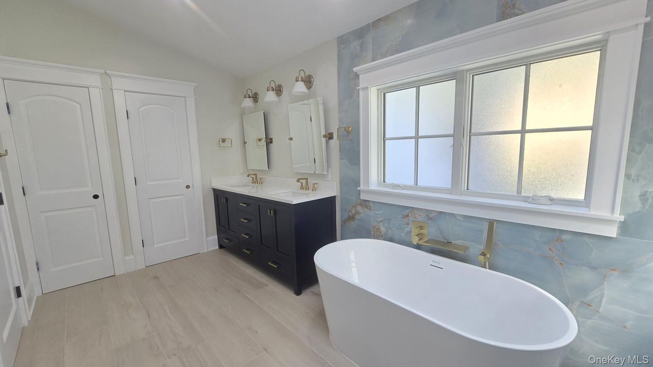 Bathroom, Dual Sink Vanities, Free Standing Baths, Interior, Recessed Lighting, Wood Texture Flooring