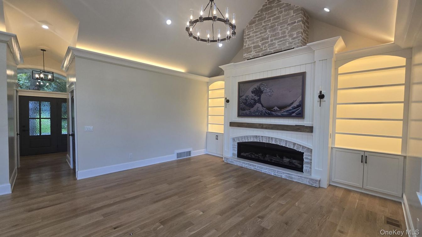 Empty room, Fireplace, Interior, Pendant Lights, Recessed Lighting, Wood Texture Flooring