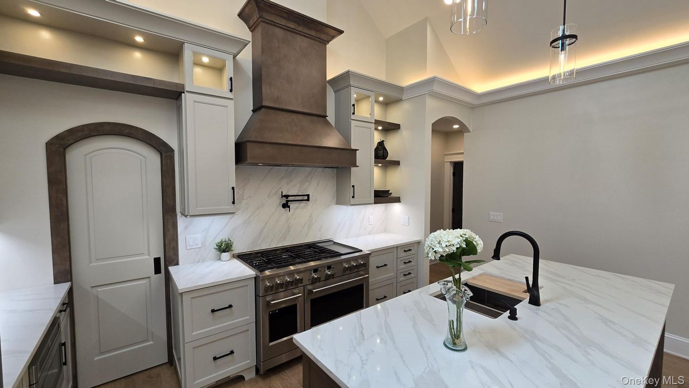 Interior, Kitchen, Marble Walls, Pendant Lights, Recessed Lighting, Stainless Steel Appliances, Wood Texture Flooring
