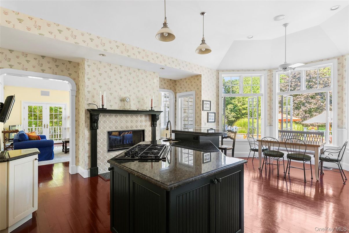 Dining room, Fireplace, Interior, Kitchen, Living room, Pendant Lights, Recessed Lighting, Wood Texture Flooring