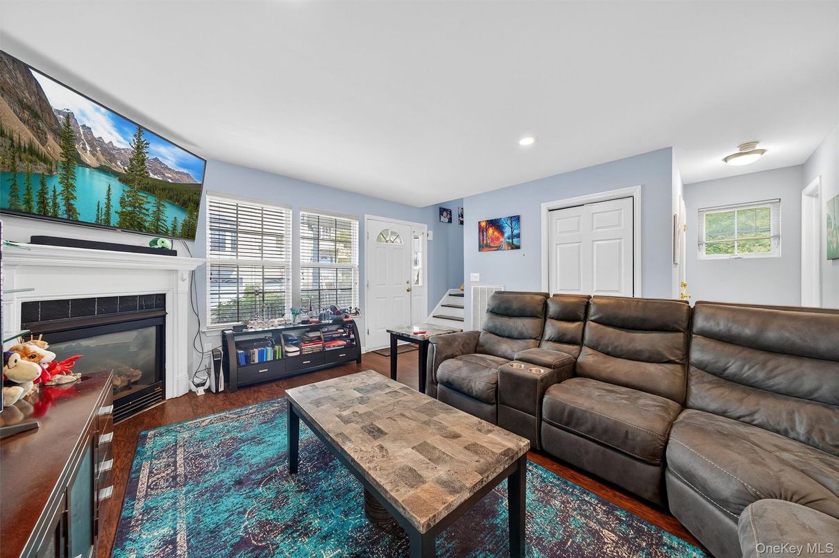 Fireplace, Interior, Living room, Recessed Lighting, Wood Texture Flooring