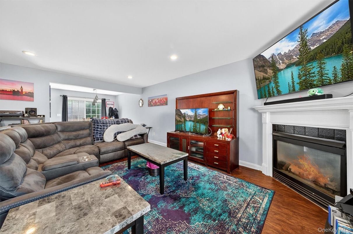 Fireplace, Interior, Living room, Recessed Lighting, Wood Texture Flooring