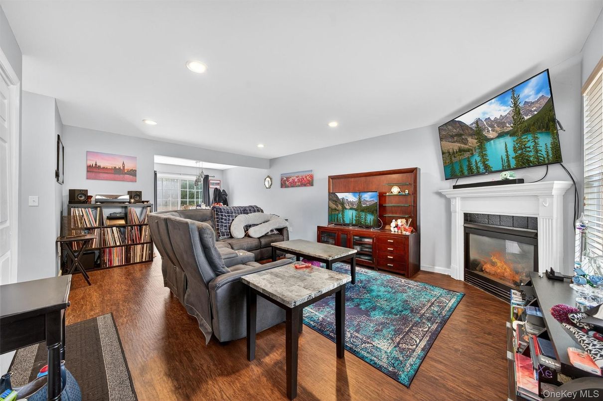 Fireplace, Interior, Living room, Recessed Lighting, Wood Texture Flooring
