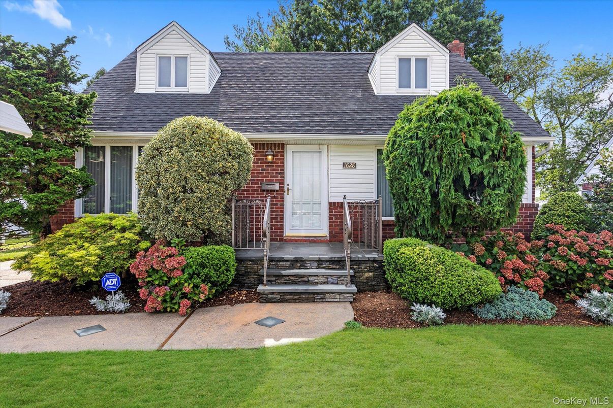 Attached, Exterior, Facade, Brick Facade, Cape Cod
