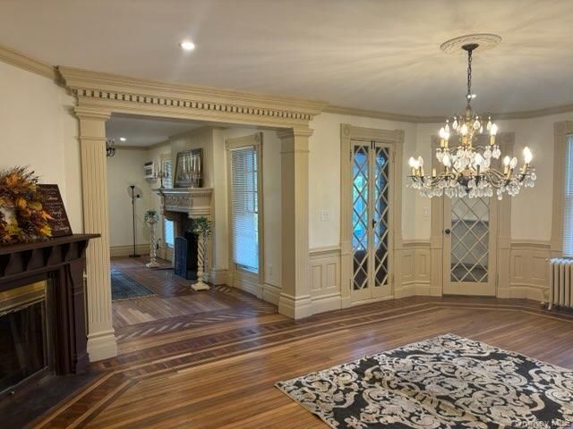Chandelier, Empty room, Fireplace, Interior, Recessed Lighting, Wood Texture Flooring