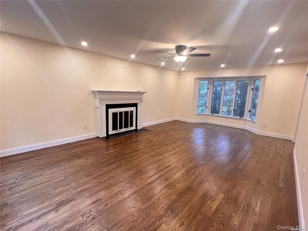 Empty room, Fireplace, Interior, Recessed Lighting, Wood Texture Flooring