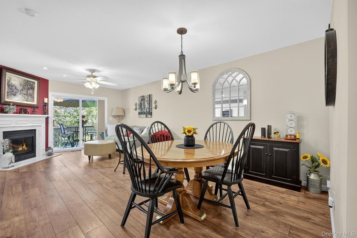 Dining room, Fireplace, Interior, Pendant Lights, Recessed Lighting, Wood Texture Flooring