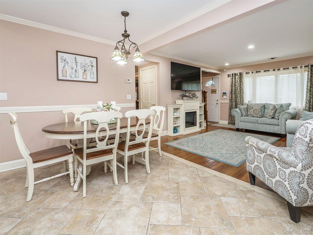 Dining room, Fireplace, Interior, Pendant Lights, Recessed Lighting, Wood Texture Flooring